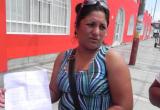 María Melgarejo dice que su esposo es pescador y que no tienen dinero.